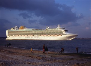 England, Hampshire, Southampton Water, The cruise ship Azura passing Calshot Spit on her maiden