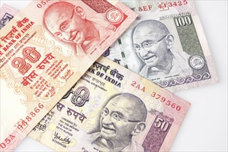 Business, Finance, Money, Indian bank notes featuring Mahatma Gandhi in twenty  fifty and one