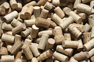 Pattern, Background, Close cropped shot of mixed traditional wine corks and synthetic closures.