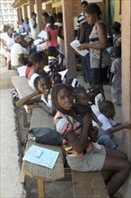 Haiti, La Gonave, Mothers with babies waiting to be vaccinated by the Scottish Charity LemonAid who