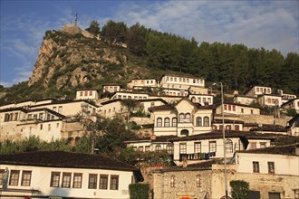 Albania, Berat, Traditional Ottoman buildings on hillside.