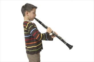 Music, Instrument, Woodwind, A schoolboy playing the clarinet. Side on  facing right.