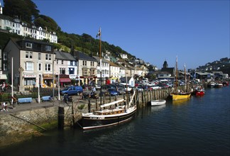 England, Cornwall, Looe, View of moored boats along the waterfront
