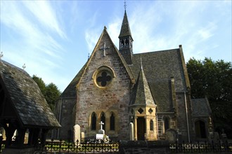 Scotland, Argyll and Bute, Luss, Church exterior with small surrounding graveyard