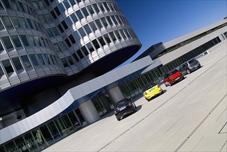 BMW Headquarters exterior. The BMW Tower which stands 101 metres tall and mimics the shape of tyres