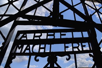 Dachau World War II Nazi Concentration Camp Memorial Site Arbeit Macht Frei slogan on gateway means