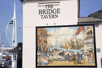 The Camber in Old Portsmouth showing the Spinnaker Tower behind the Bridge Tavern with its mural of
