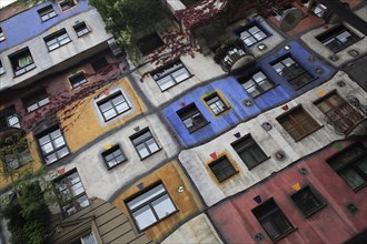 Hundertwasser-Krawinahaus angled part view of colourful apartment exterior. Photo : Bennett Dean