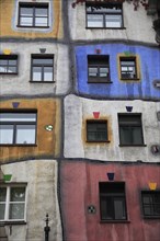 Hundertwasser-Krawinahaus part view of colourful apartment exterior. Photo : Bennett Dean