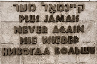 Dachau World War II Nazi Concentration Camp. Sign written in Hebrew French English German and