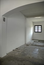 Dachau World War II Nazi Concentration Camp Memorial Site. Empty interior of reconstructed prisoner
