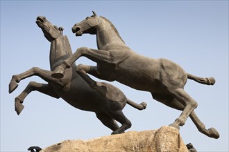 Statue of two galloping horses. Photo: Mel Longhurst