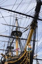 Bow and rigging of Admiral Lord Nelsons flagship HMS Victory showing the ships figurehead in the