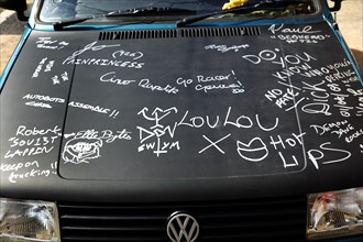 Graffiti on car bonnet. Photo : Stephen Rafferty