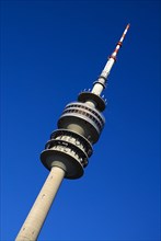 Olympic Tower or Olympiaturm. Angled view of top of tower against cloudless blue sky. Photo : Hugh