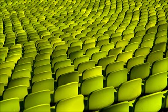 Olympic Stadium. Curved section of bright green seating in the stadium. Photo: Hugh Rooney