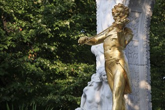 Part view of statue of Johann Strauss in the Stadt Park. Photo: Bennett Dean