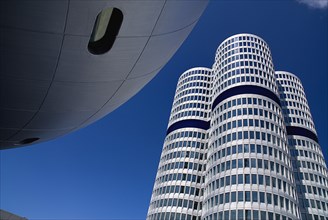 BMW Headquarters exterior. Part view of the BMW Tower which stands 101 metres tall and mimics the