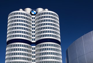 BMW Headquarters exterior. Part view of the BMW Tower which stands 101 metres tall and mimics the
