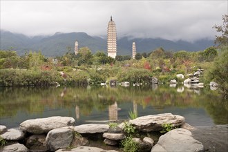 San Ta Si The three pagodas seen from across pond. Photo : Mel Longhurst