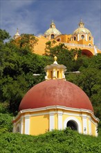 Mexico, Puebla, Cholula, Church of Neustra Senor de los Remedios on tree covered hillside above the