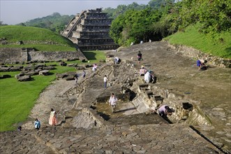 Mexico, Veracruz, Papantla, El Tajin archaeological site Archaeologists at work at Tajin Chico with