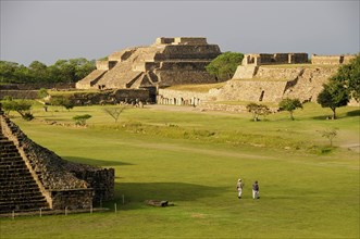 Mexico, Oaxaca, Monte Alban, Ruins of Los Danzantes and Monticulo buildings and central plaza.
