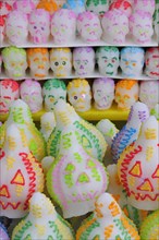 Mexico, Puebla, Sugar candies shaped as skulls and lanterns for Dia de los Muertos or Day of the