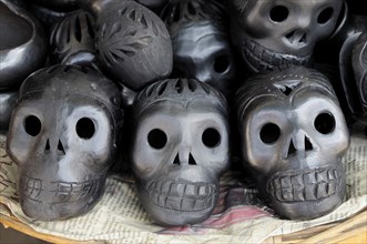 Traditional black ceramics in the form of skulls