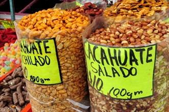 Mexico, Oaxaca, Peanuts for sale on market stall. 
Photo : Nick Bonetti