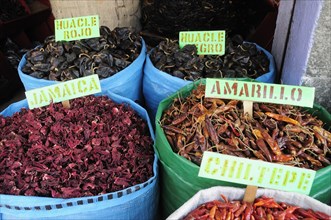 Mexico, Oaxaca, Sacks of dried chillies for sale in the market. 
Photo : Nick Bonetti