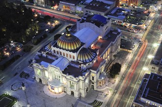 Mexico, Federal District, Mexico City, View over Palacio Bellas Artes illuminated at night from