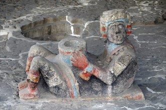 Mexico, Federal District, Mexico City, Chac Mool figure at the entrance to Tlaloc Shrine in the