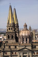 Mexico, Jalisco, Guadalajara, Cathedral part view of exterior facade roof dome and spires. 
Photo