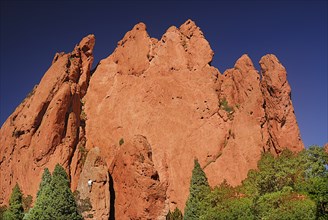 USA, Colorado, Colorado Springs, Garden of the Gods public park figure of climber on face of large