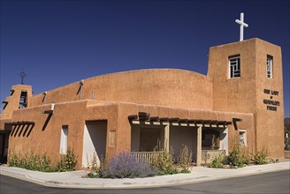 USA, New Mexico, Taos, Our Lady of Guadalupe Parish Church built in the typical adobe style
