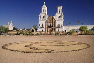 USA, Arizona, Tucson, Mission Church of San Xavier del Bac. Exterior facade with raised mosaic