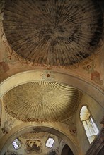 USA, Arizona, Tucson, Mission Church of San Xavier del Bac interior detail of painted ceiling.