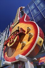 USA, Nevada, Las Vegas, The Strip exterior of the Hard Rock Cafe with detail of guitar sign.