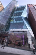 Japan, Honshu, Tokyo, Harajuku. Audi Forum building on Meiji-dori Avenue unusual glass fronted