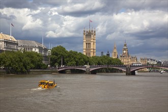 England, London, Vauxhall Duck Tour water taxi on the river Thames heading toward the Houses of