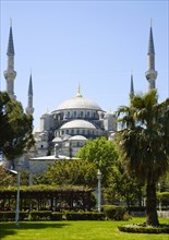 Turkey, Istanbul, Sultanahmet Camii The Blue Mosque with domes and minarets seen from the gardens.