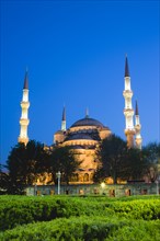 Turkey, Istanbul, Sultanahmet Camii The Blue Mosque domes and minarets at sunset with son et
