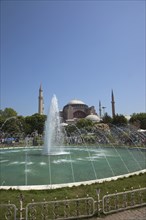 Turkey, Istanbul, Sultanahmet Ayasofya Muzesi Hagia Sofia Museum with fountain in the foreground.