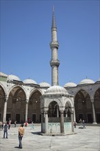 Turkey, Istanbul, Sultanahmet Camii Blue Mosque courtyard with minaret. 
Photo : Stephen Rafferty