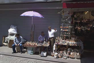 Turkey, Istanbul, Eminonu Misir Carsisi Spice Market metal goods vendors at the entrance. 
Photo :