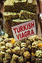 Turkey, Istanbul, Eminonu Misir Carsisi Spice Market interior. Turkish Viagra snack made with nuts.
