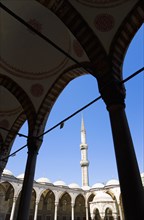 Turkey, Istanbul, Sultanahmet Camii The Blue Mosque Courtyard with minaret. 
Photo : Paul Seheult