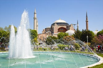 Turkey, Istanbul, Sultanahmet Haghia Sophia with dome and minarets beyond the water fountain in the
