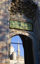 Turkey, Istanbul, Sultanahmet Camii The Blue Mosque Courtyard and minaret seen through the exit to